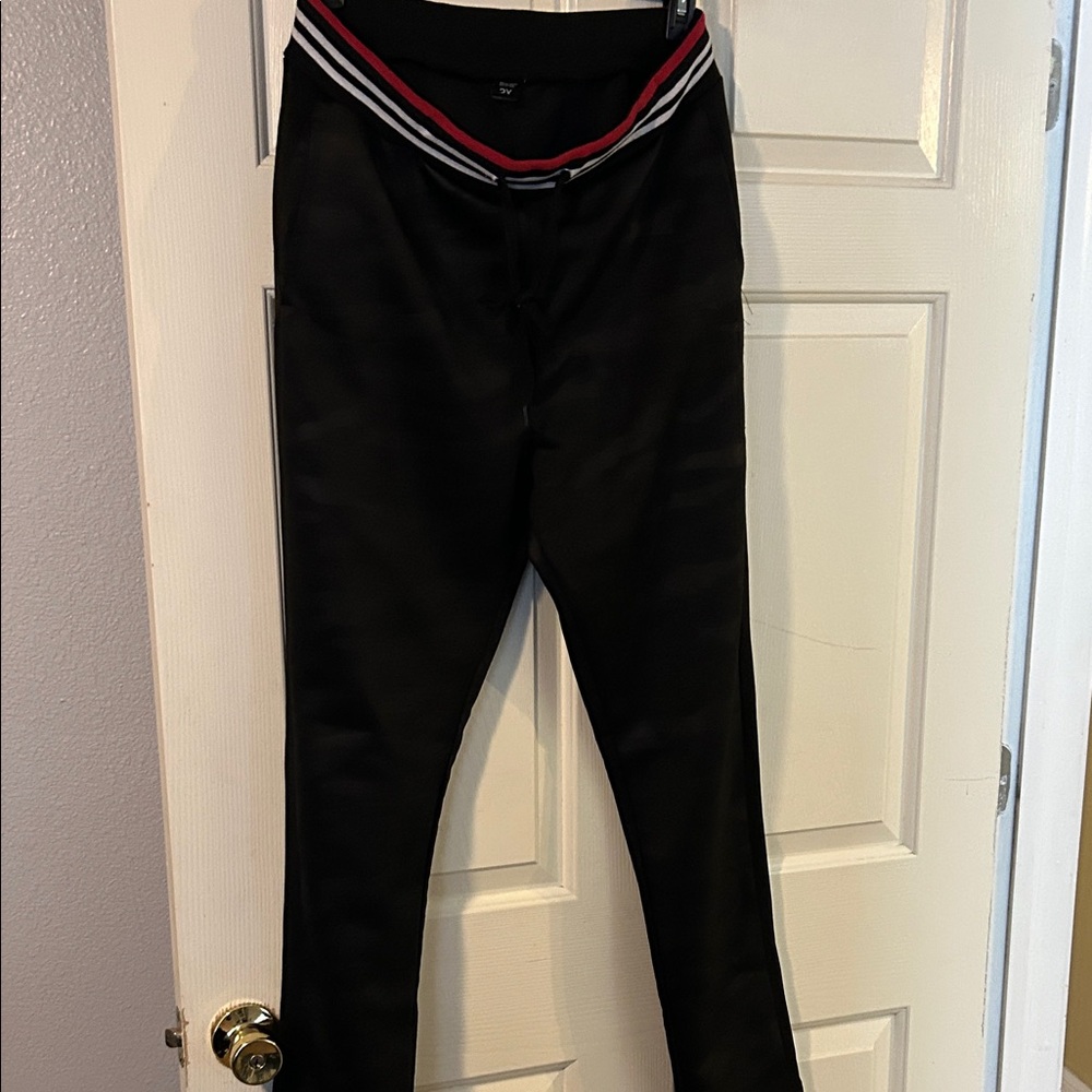 Black Pants with Red and White Striped Waistband